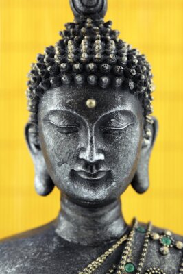 Obraz Pomnik Buddy na żółtym tle