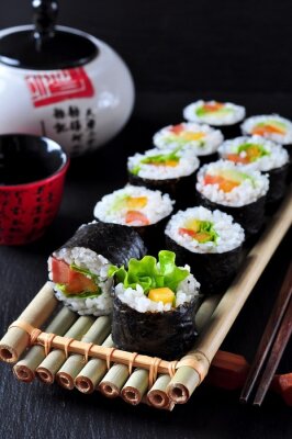 Obraz Sushi na desce bambusowej